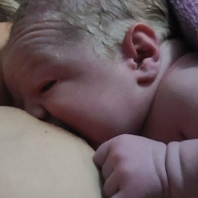 woman breastfeeding baby